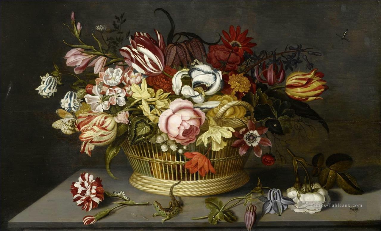 Fleurs dans un panier avec un oeillet une rose et un lézard sur une table Ambrosius Bosschaert Peintures à l'huile